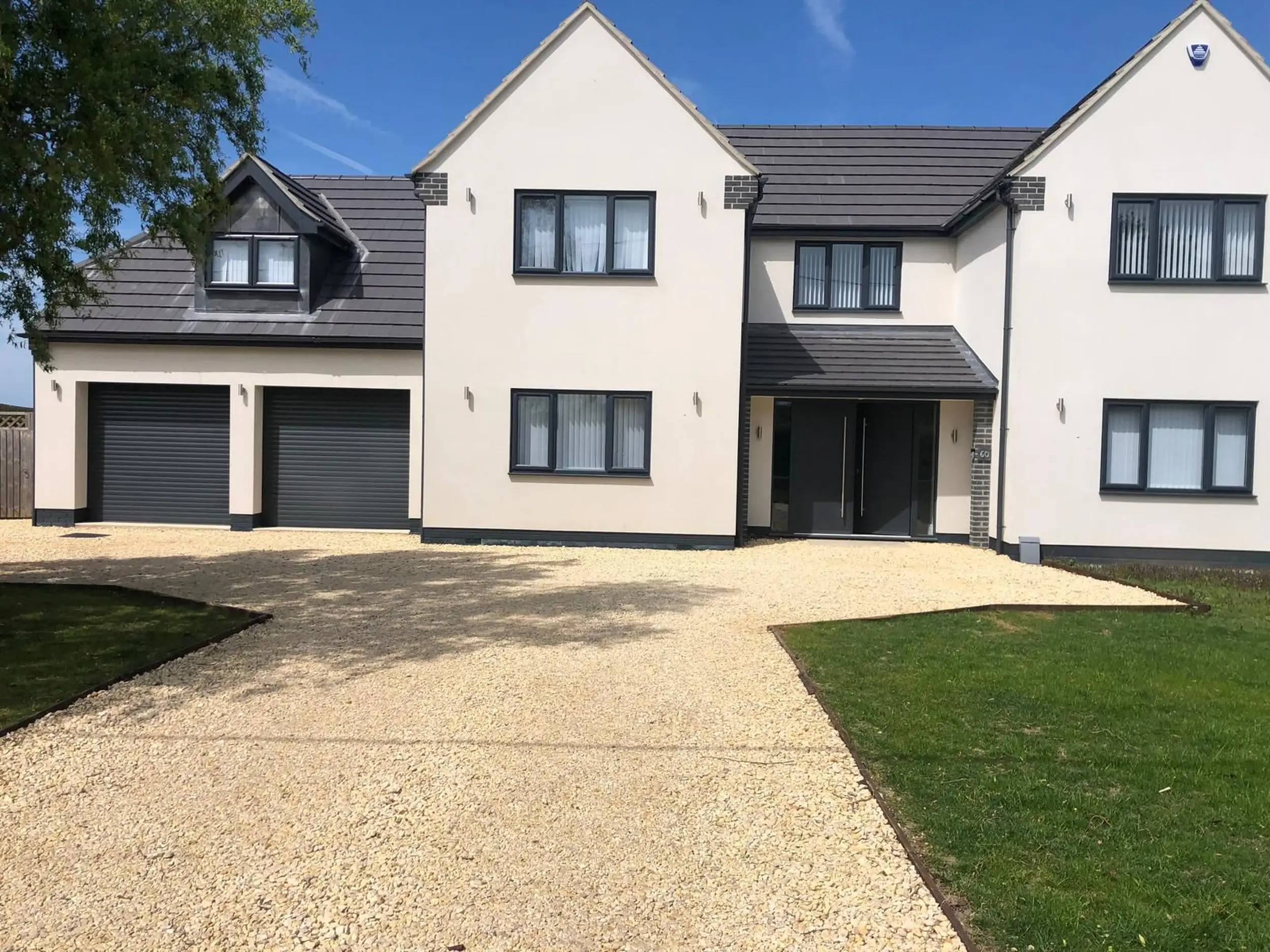 Completed driveway and front elevation